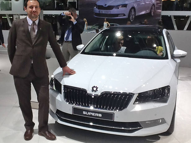 Ray Leddy PR & Marketing Manger Skoda picture with the new Skoda Superb